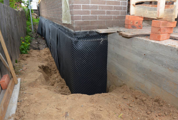 SJ Waterproofing Pros technician performing targeted Waterproofing assessment in Chester, SC